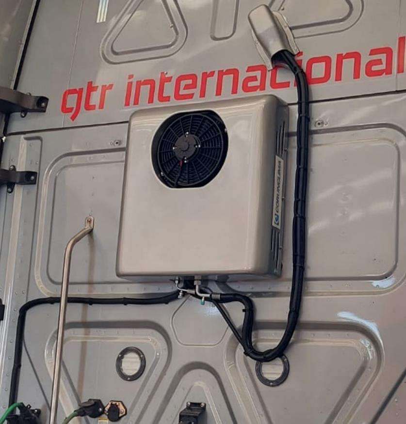 Electric APU installed on the rear wall of a truck cab
